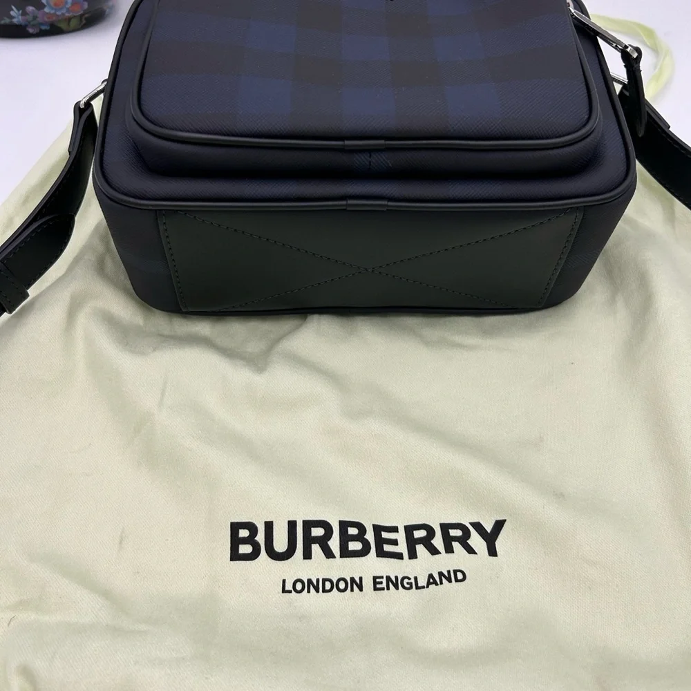 Men's Burberry, check messenger bag in navy blue. Adjustable shoulder strap.